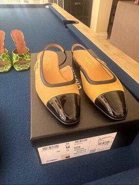 CHANEL Beige and Black Cap-Toe Slingback Mules